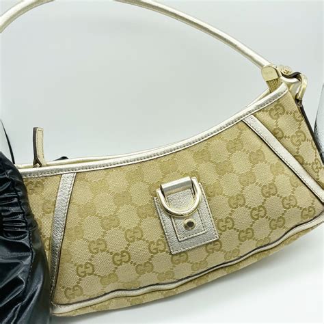 gucci white logo baguette|gucci shoulder bag 2022.